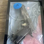 Metal Gun-shaped Keychains Set Black Gold Military Theme Detachable Keyring. Fixed Price $25.00.